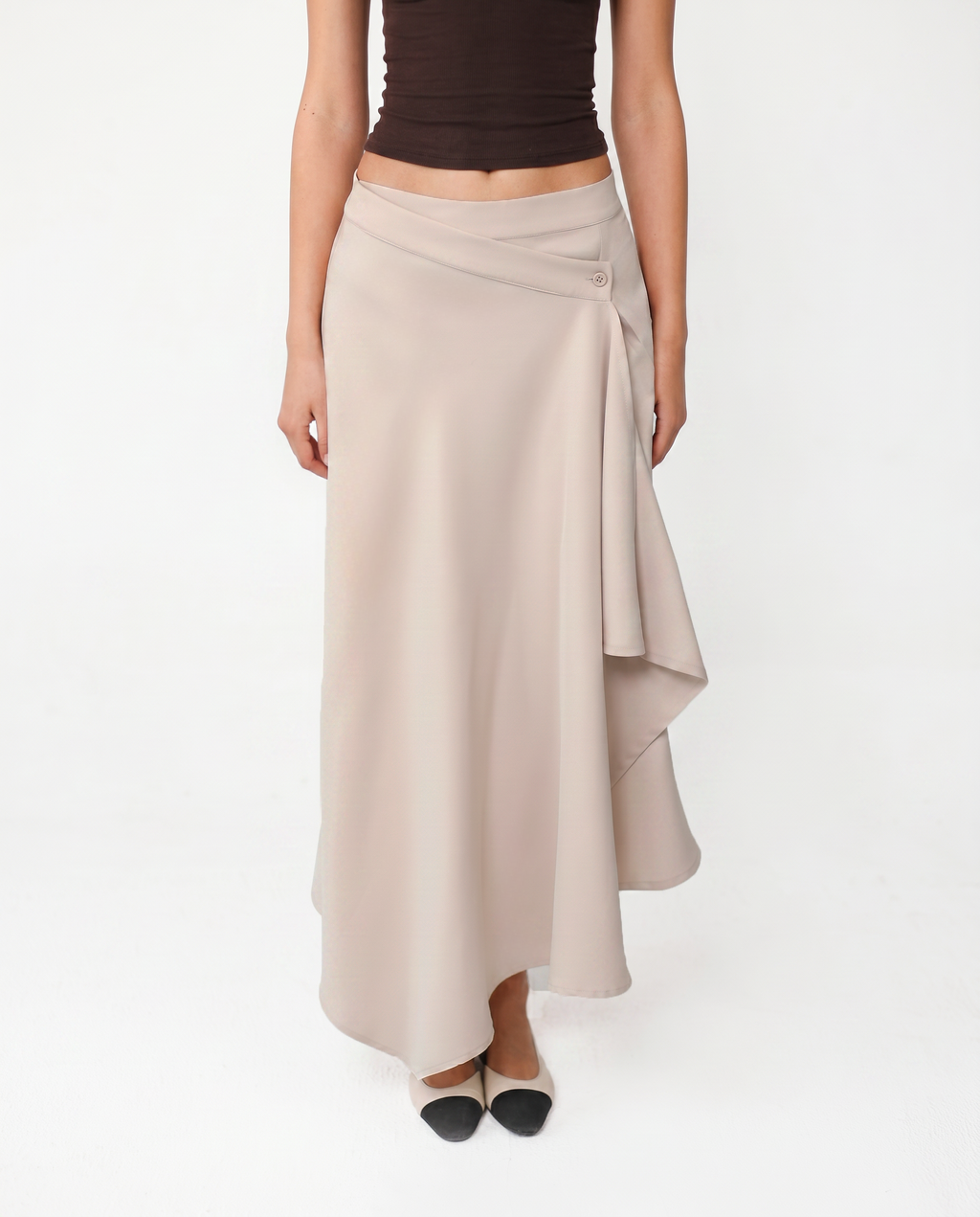 LAYERED MIDI SKIRT WITH RUFFLEIN BEIGE