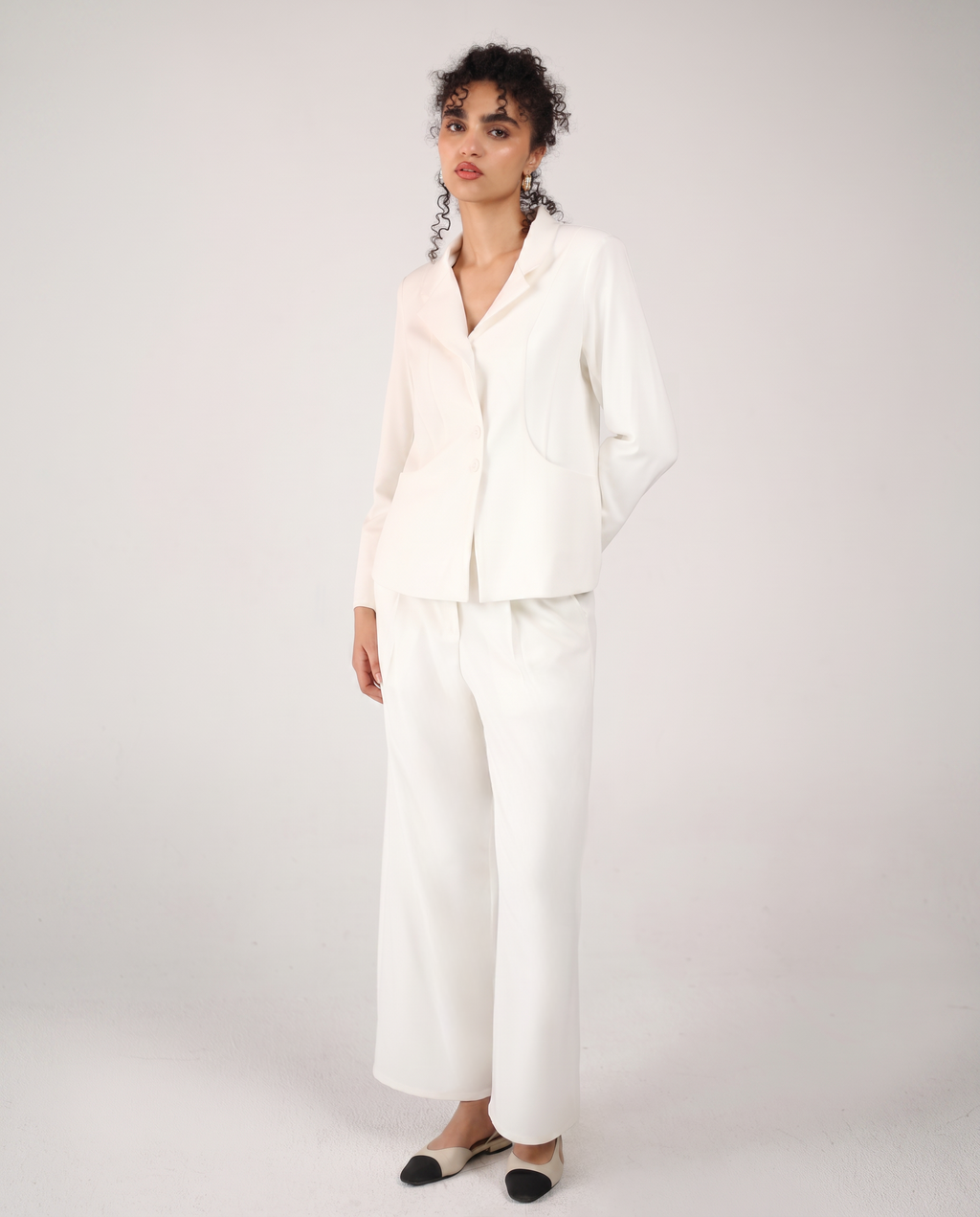 STRAIGHT-LEG TROUSERS IN OFF WHITE